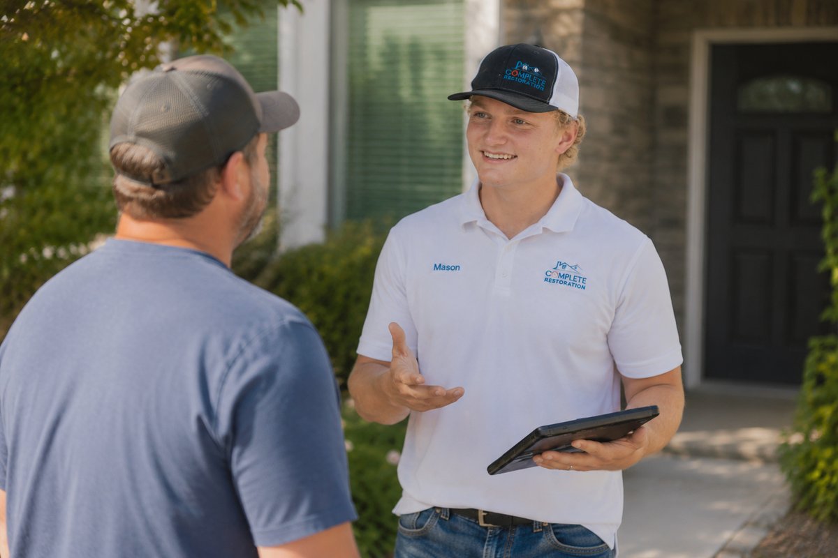 Mason consulting with a homeowner